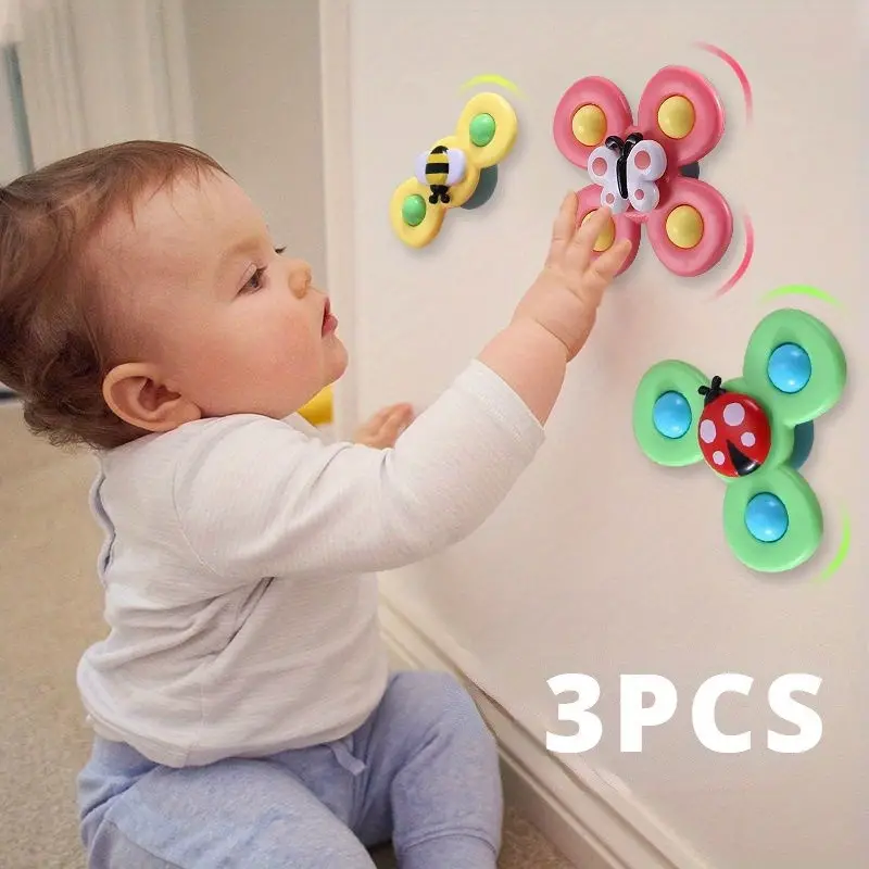 Set de 3 juguetes giratorios con ventosa para bebé