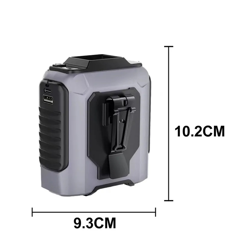 Ventilador portátil gris con cotas de dimensiones de 10.2 cm de alto y 9.3 cm de ancho.